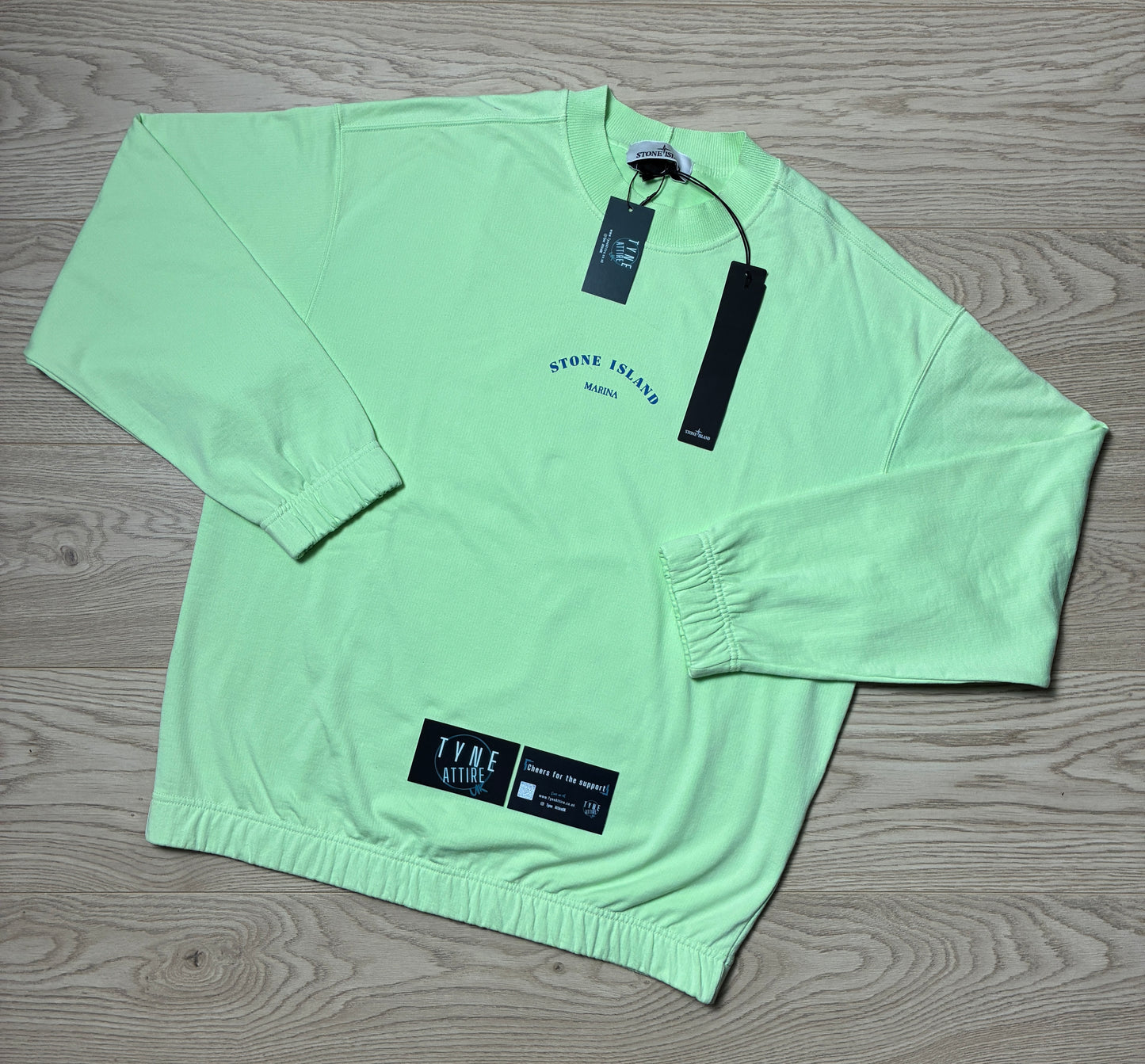Stone Island Marina 652X2 Plated Dyed Reflective Logo Print Light Green Crewneck Sweater