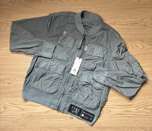 C.P. Company Chrome-R Nylon Garment Dyed Multi Pocket Embroidered Spellout Logo Sky Blue Bomber Jacket