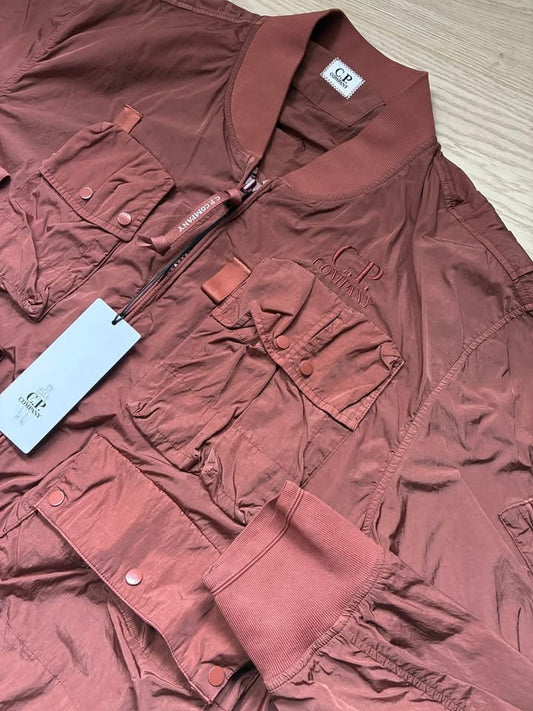 C.P. Company Chrome-R Nylon Garment Dyed Multi Pocket Embroidered Spellout Logo Rust Brown Bomber Jacket