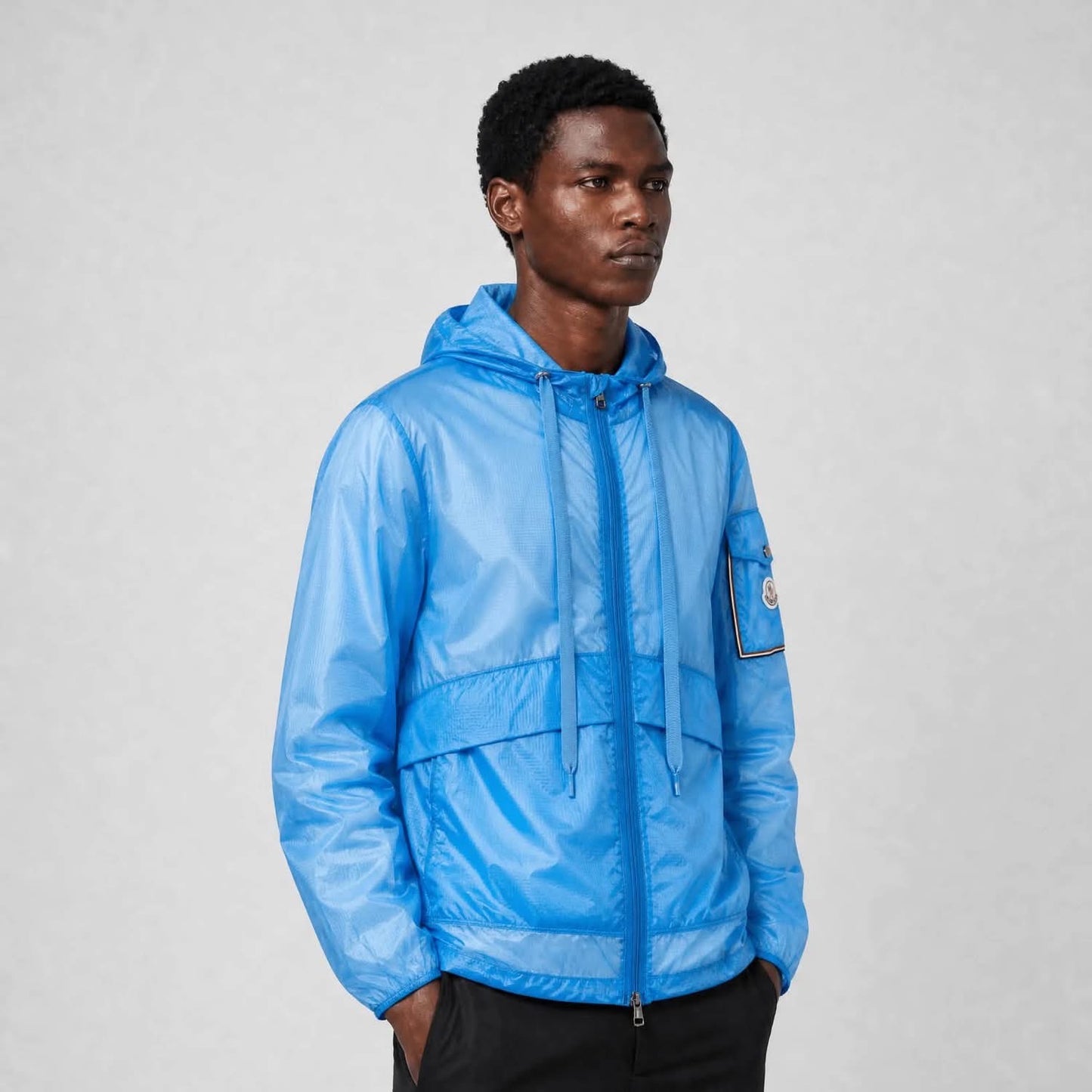 Moncler Ebizo Reflective Spellout Logo Sky Blue Nylon Ripstop Lightweight Hooded Windbreaker Jacket