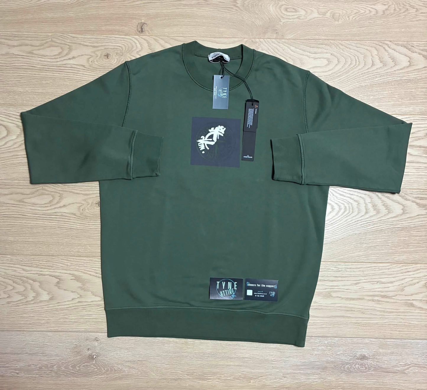 Stone Island 66559 ‘Institutional One’ Cotton Fleece Compass Graphic Logo Garment Dyed Green Sweater